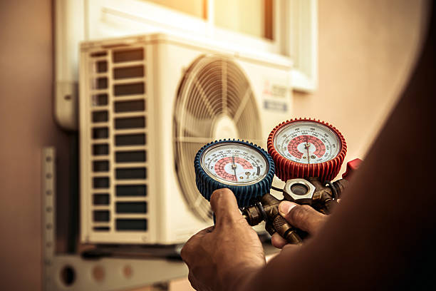 Professional Heat Pump Repair technician working in Clayton, MO